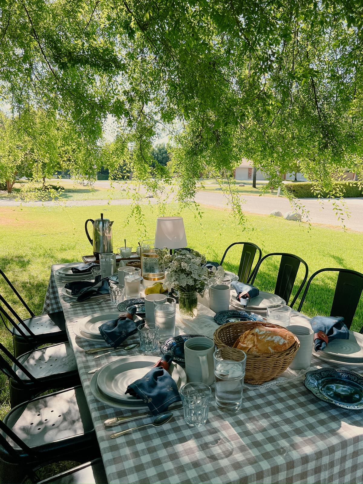 Artistic table setting with unique decor and vintage tableware for intimate gathering in Bakersfield