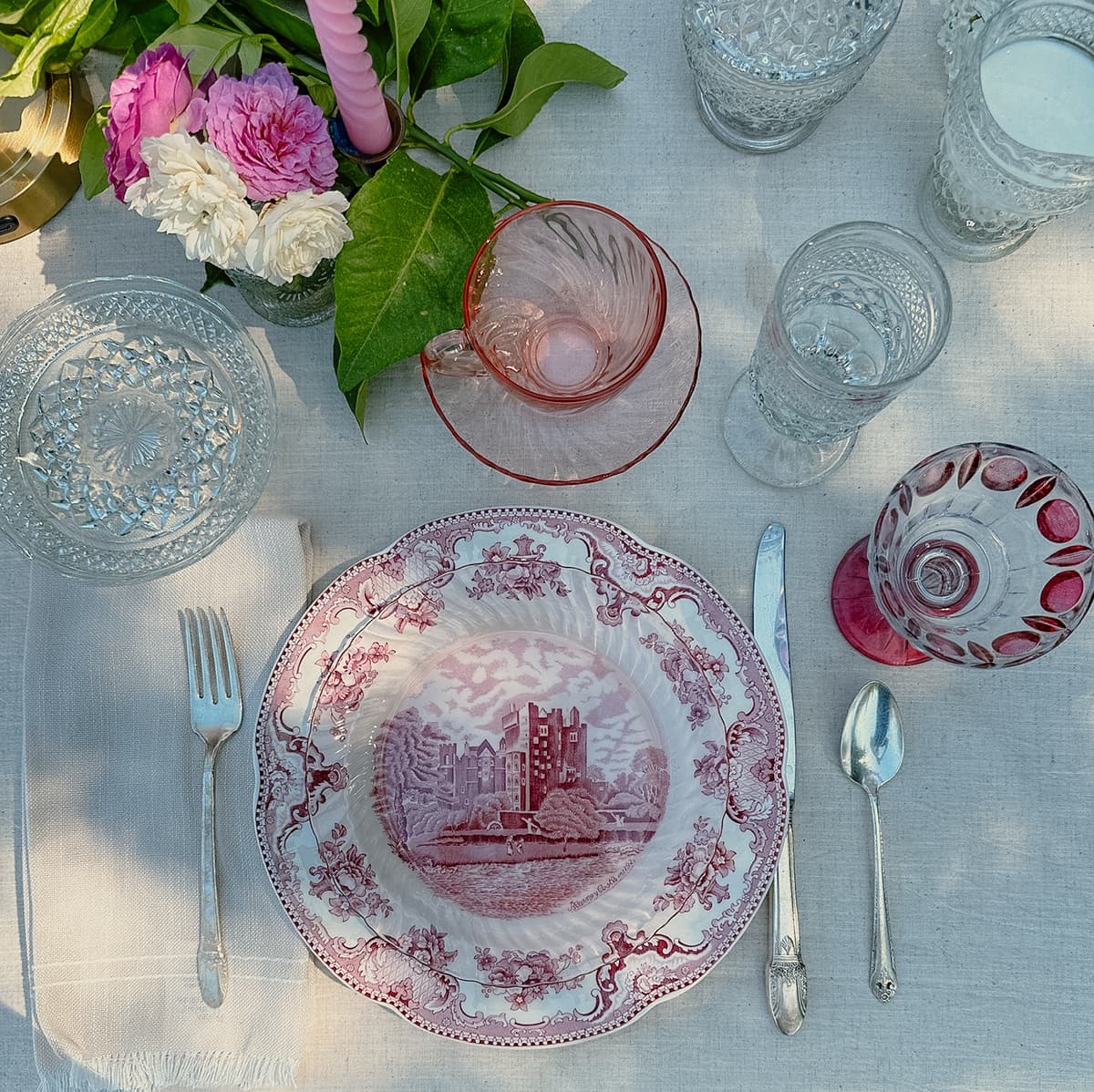 Bohemian table setting with eclectic decor and vintage tableware for intimate gathering in Bakersfield