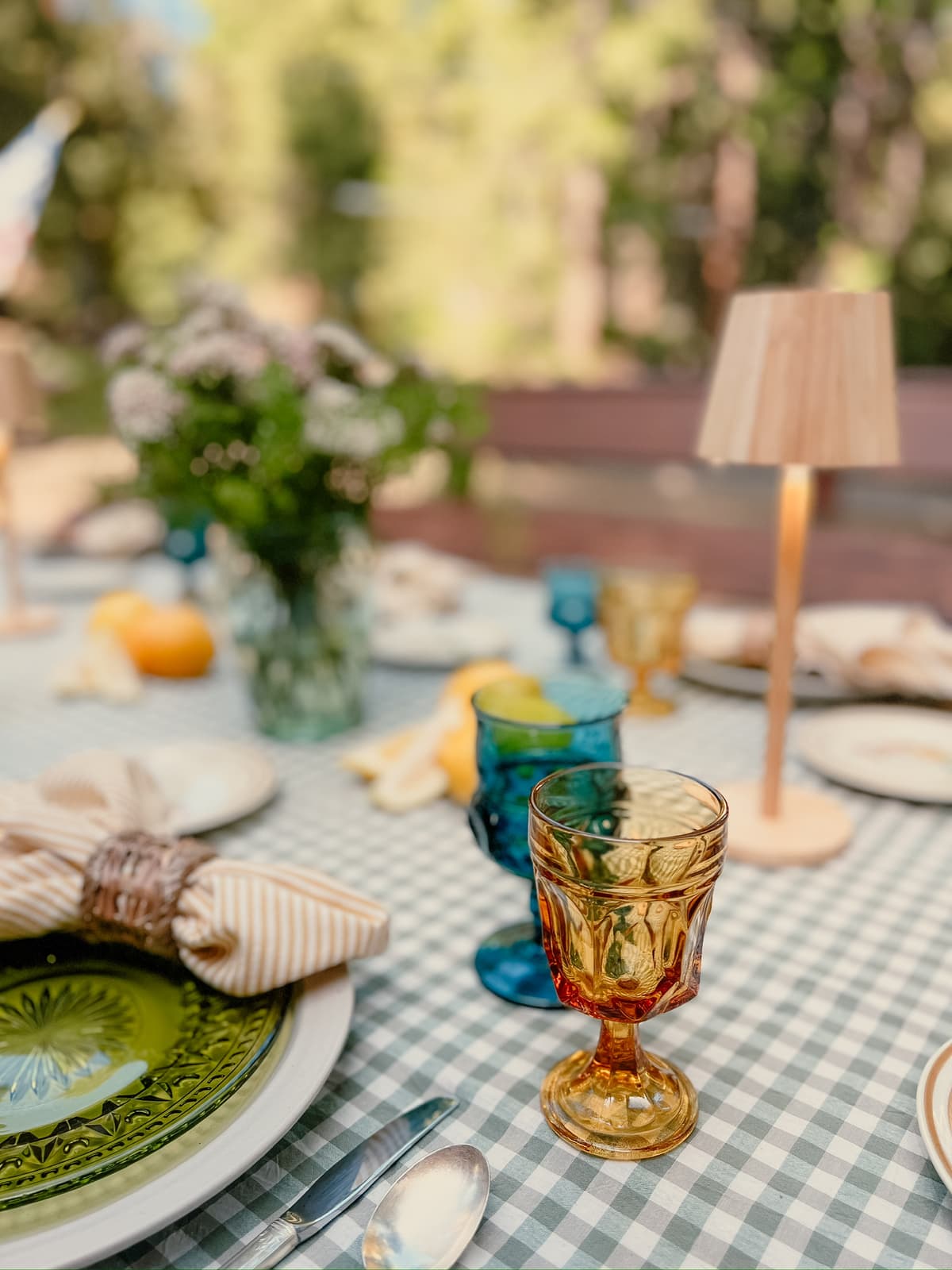 Elegant table setting with vintage china and floral arrangements for intimate gathering in Bakersfield