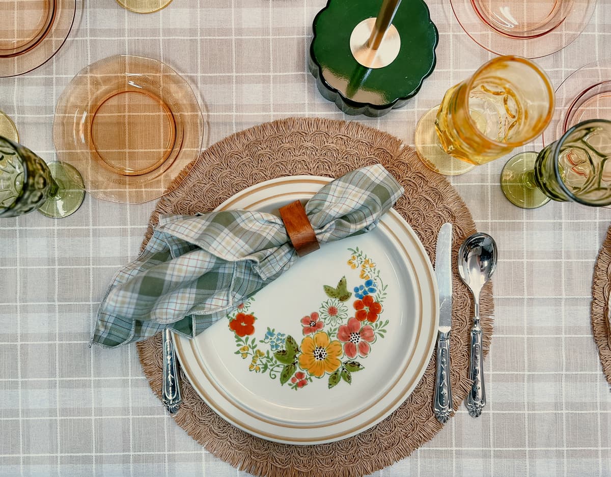 Bohemian table setting with eclectic decor and vintage tableware for intimate gathering in Bakersfield