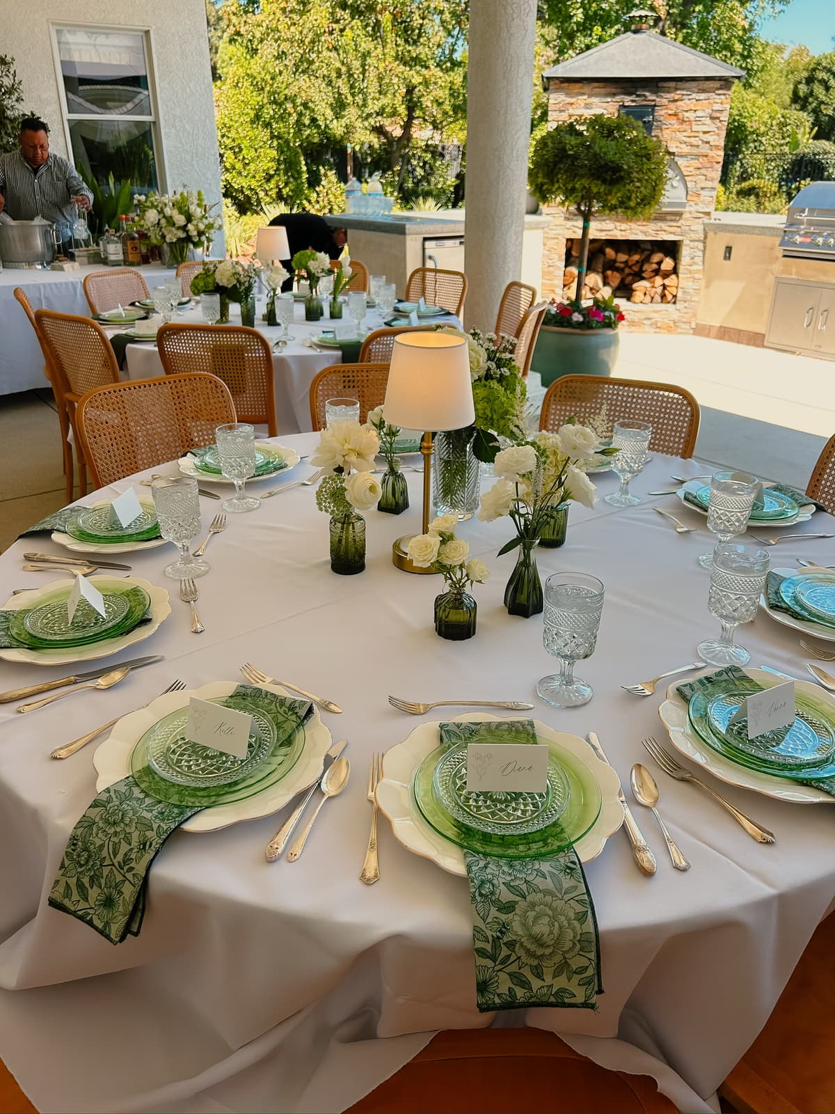 Elegant vintage table setting with floral centerpiece and vintage china