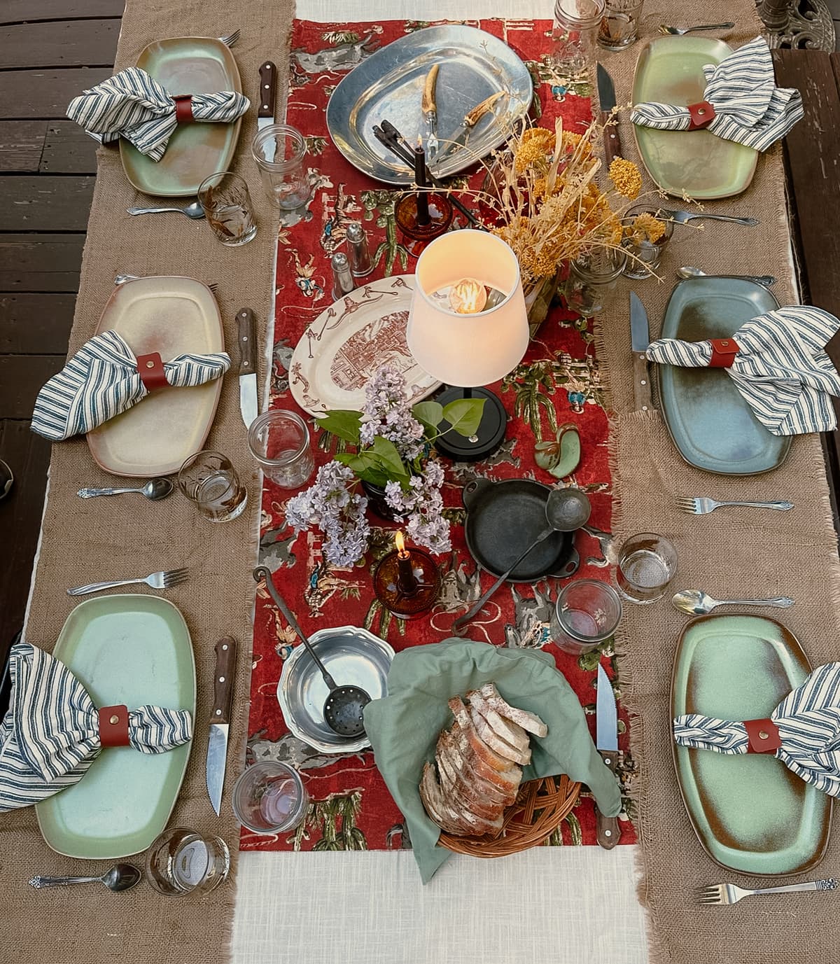 Charming garden-inspired table setting with floral arrangements and vintage tableware