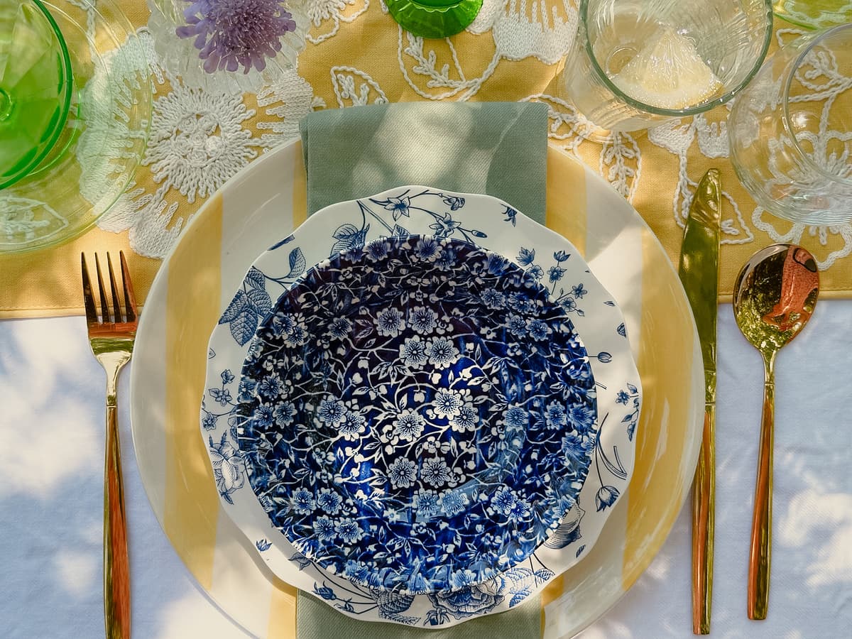 Sophisticated table setting with elegant vintage china and crystal glassware