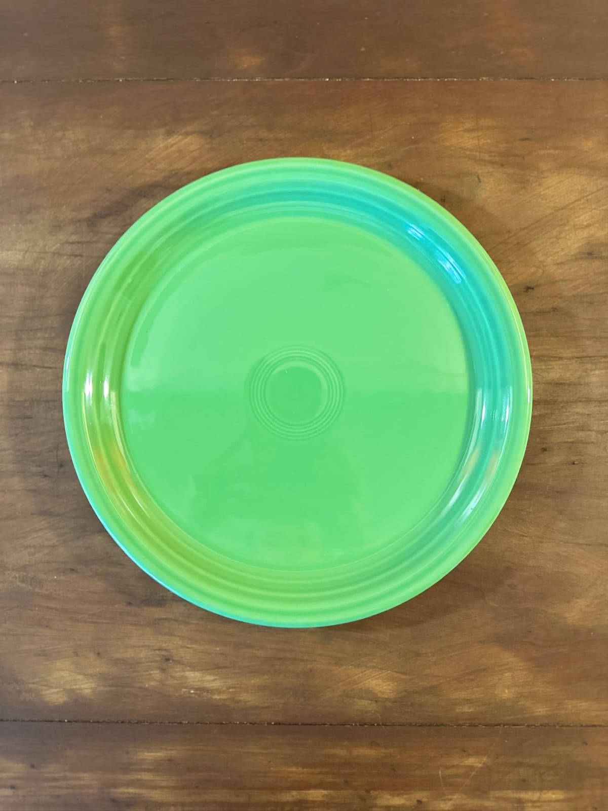 Artistic centerpiece with candles and greenery